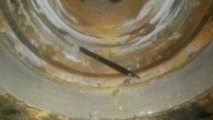 washouts in the wear plate area
